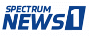 A blue and white logo for spectrum news.
